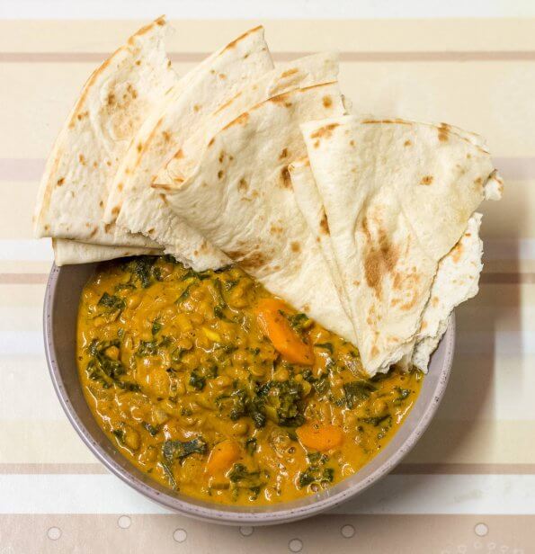 lentil and kale curry with flour tortilla